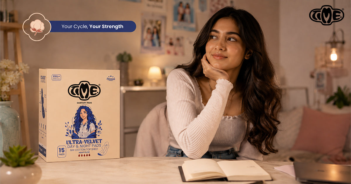 A women is reading a book and the TIME sanitary pads is placed on the table