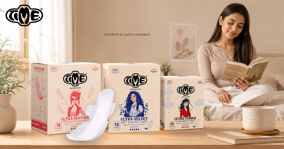 A women is reading th book and the TIME sanitary pads are placed on the table